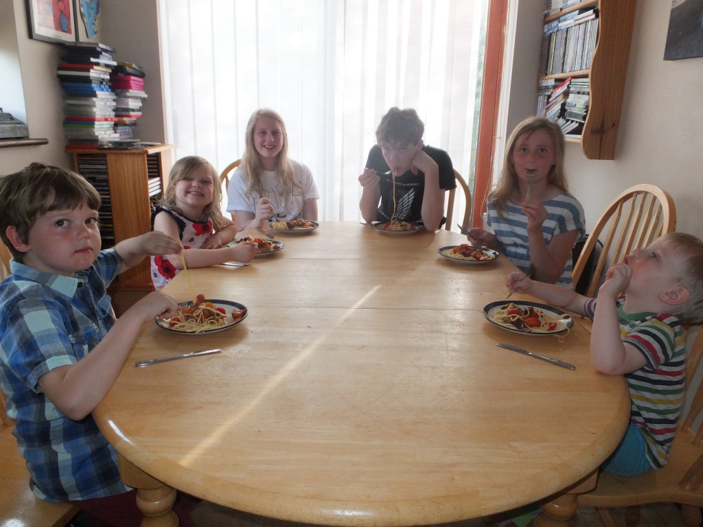 All six of the children eating the Tomato and Mushroom Bolognese.